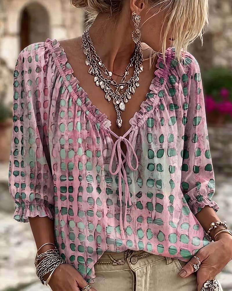 Lena | Blouse met stippenpatroon en vetersluiting