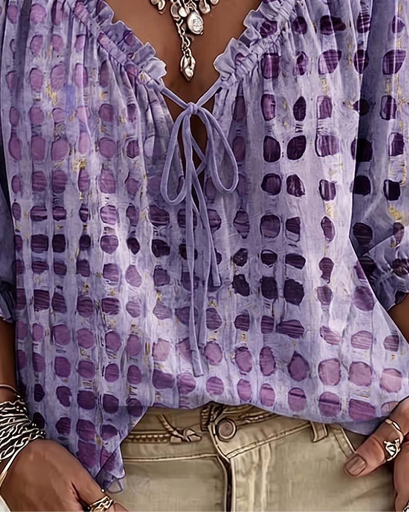 Lena | Blouse met stippenpatroon en vetersluiting