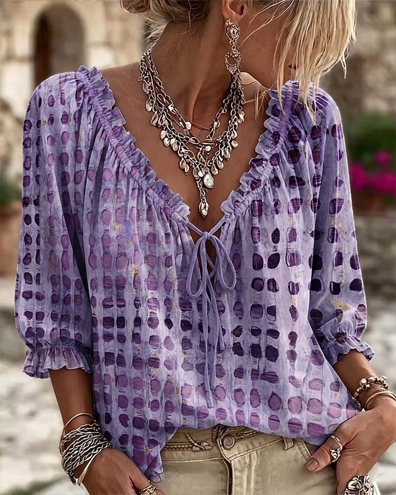 Lena | Blouse met stippenpatroon en vetersluiting