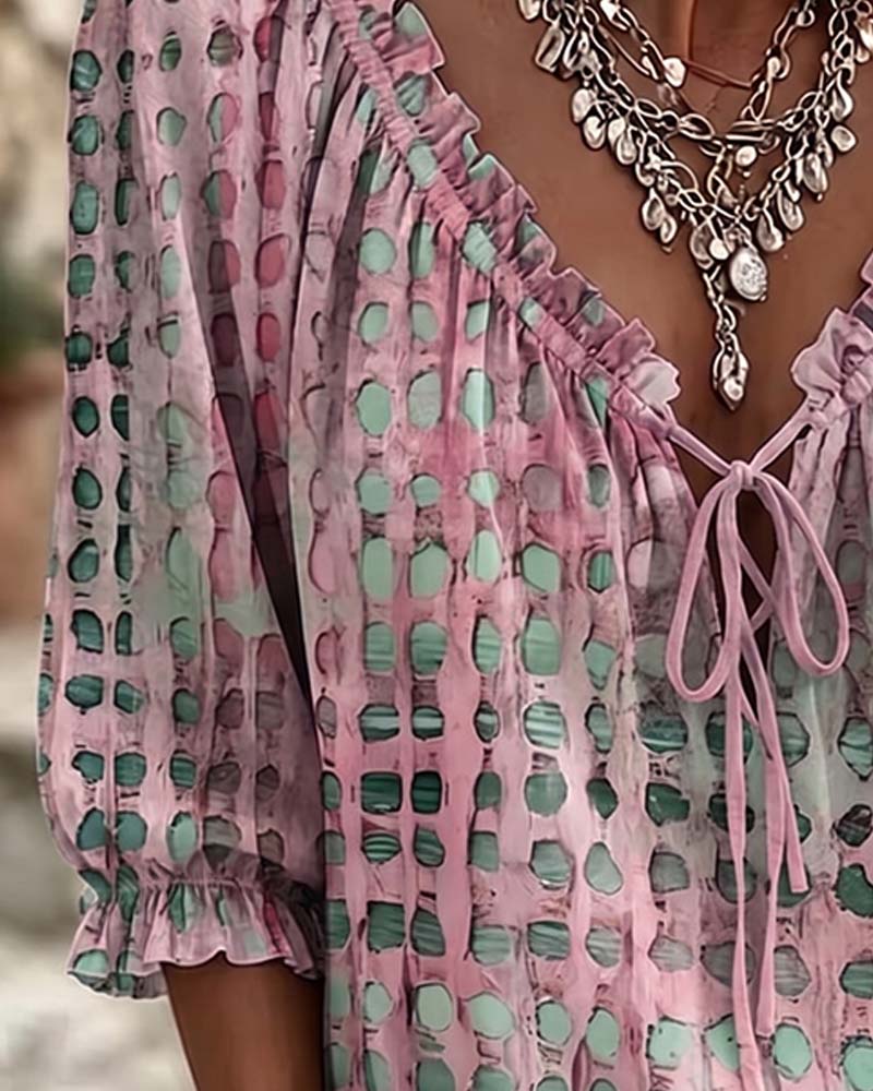 Lena | Blouse met stippenpatroon en vetersluiting