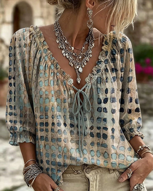 Lena | Blouse met stippenpatroon en vetersluiting