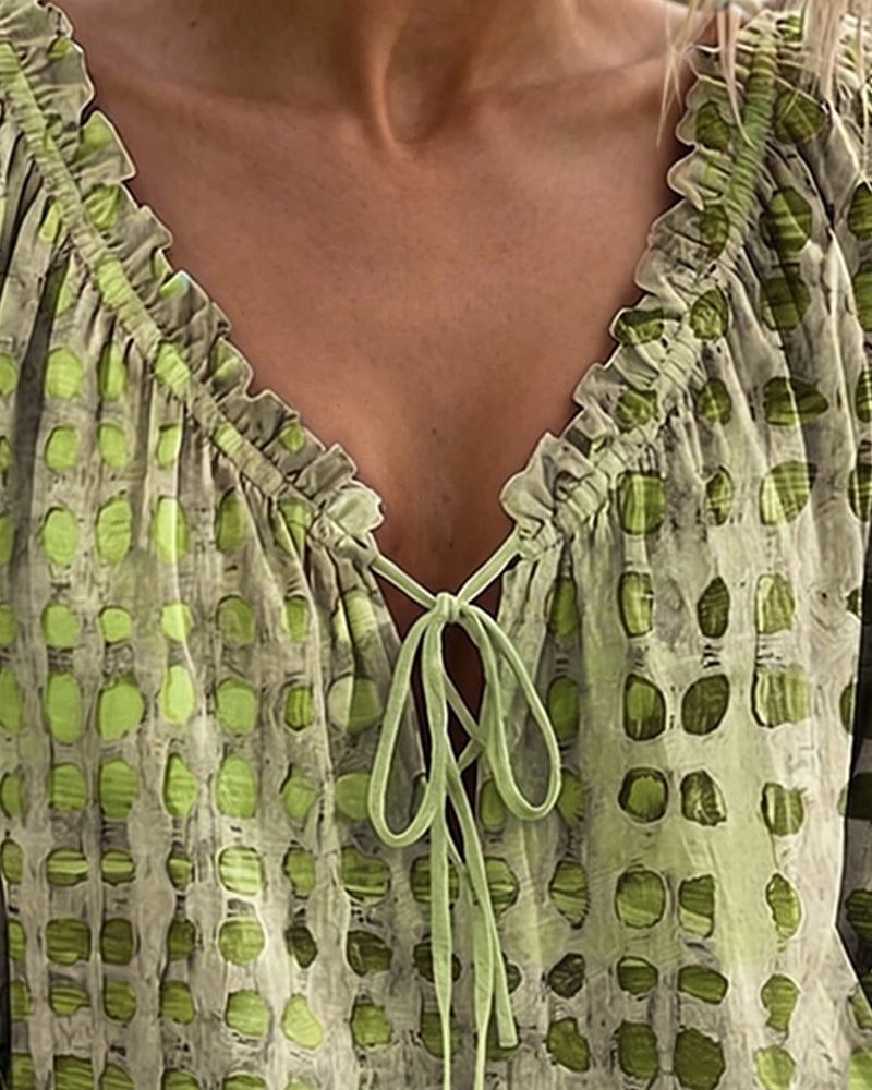 Lena | Blouse met stippenpatroon en vetersluiting