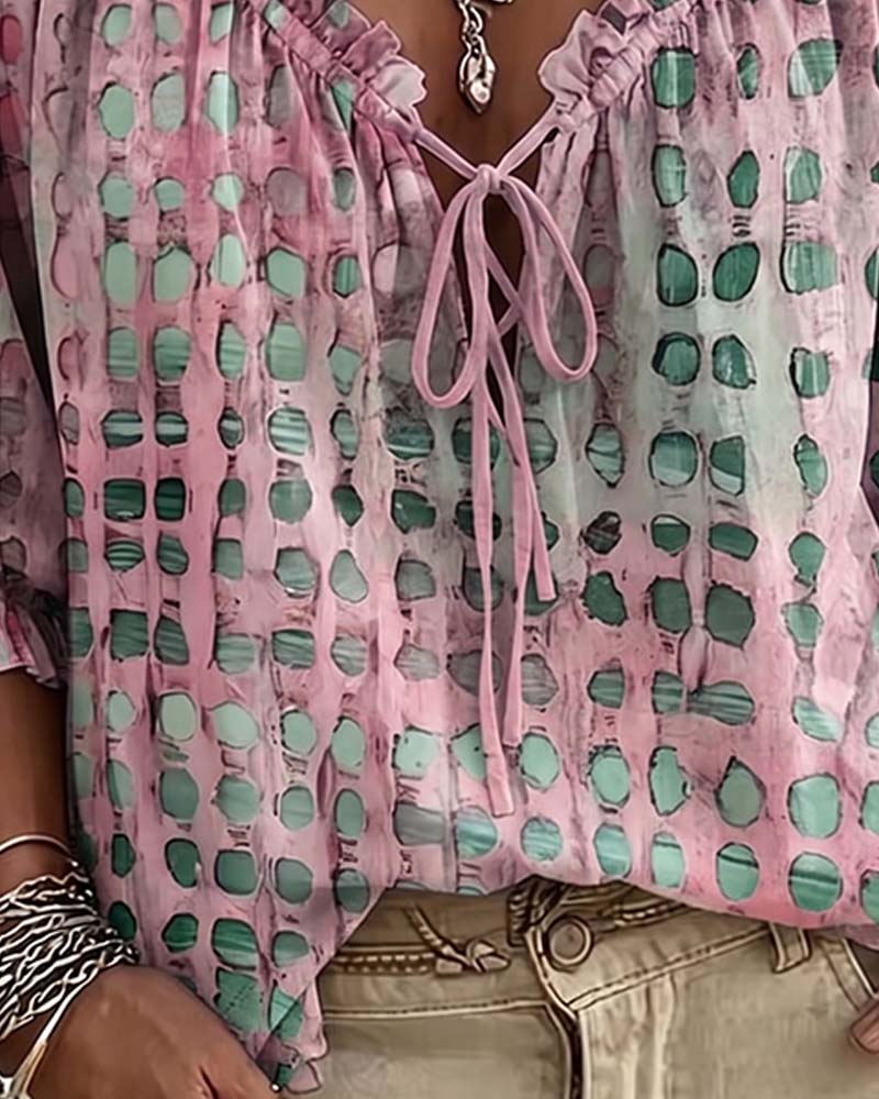 Lena | Blouse met stippenpatroon en vetersluiting