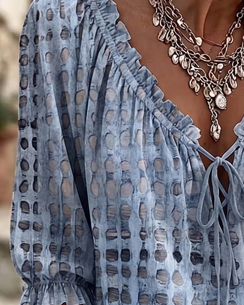 Lena | Blouse met stippenpatroon en vetersluiting