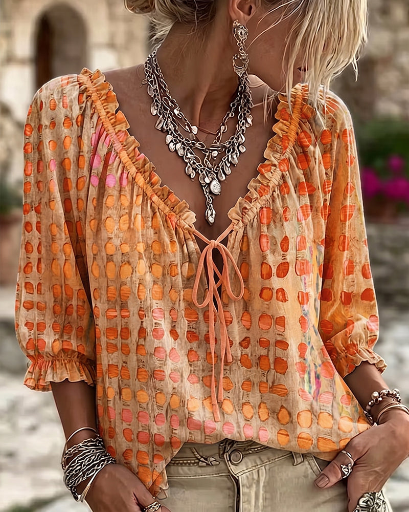 Lena | Blouse met stippenpatroon en vetersluiting